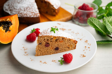 Delicious whole wheat vegan cake with papaya and nuts.