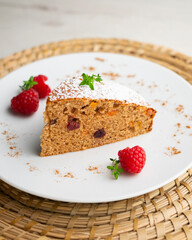Delicious whole wheat vegan cake with papaya and nuts.