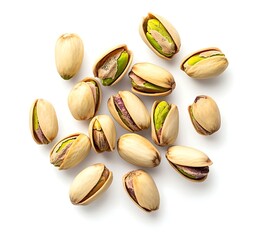 A top view of pistachios falling against a clean white background, showcasing their vibrant green shells and unique shapes in a dynamic, scattered arrangement.