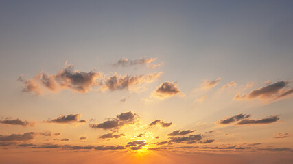 abstract background of cloudy sunset sky golden hour