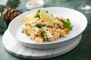 Traditional Russian salad with chicken fillet