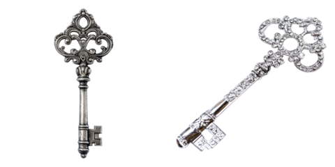 Ornate silver keys with intricate designs on transparency background