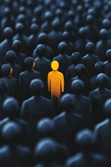 Fototapeta premium A lone figure in yellow stands out among dark silhouettes
