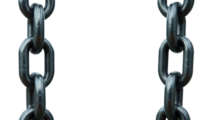 Two metal chains hanging with blurred bridge background and transparent background