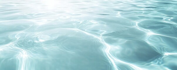 Obraz premium Transparent water surface with gentle ripples and reflections of light
