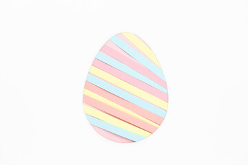 Paper strips in egg shape on white background