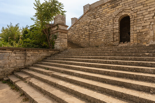 Mithridates Staircase in Kerch. Ancient stone steps lead to the top of Mount Mithridates, demonstrating historical architecture in the midst of nature.