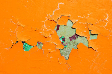 Peeling paint background, orange peeling paint on the old rough concrete surface, texture...