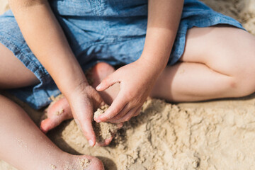 hands on the sand
