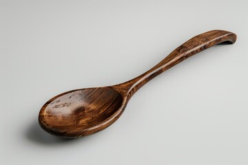 high detail image of Single wooden spoon displayed in an isolated setting for a clear view