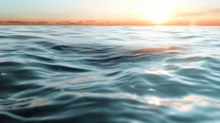 Obraz premium Ocean waves gently ripple under a vibrant sunset sky, blending colors for a soothing and serene seascape view.