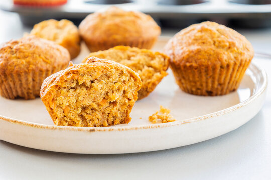  delicious carrot and pineapple muffins on a bright background close-up