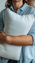 Embracing Comfort: A Man's Gentle Hug with a Pillow for Rest and Relaxation, Creating a Cozy Haven for Sleep and Serenity at Home