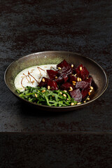 Smoked beetroot with Parmesan espuma. A delicate balance of smoky, creamy, and savory flavors.