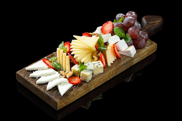 A beautifully arranged fruit platter on a wooden board, featuring a selection of fresh fruits and berries. Restaurant-style presentation with vibrant colors and elegant plating. Captured under studio 