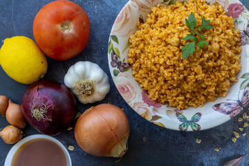 Traditional Turkish bulgur pilaf in a plate (Turkish name; Chickpea bulgur pilaf)