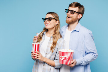 Young couple two friends family man woman wear shirt casual clothes together 3d glasses watch movie...