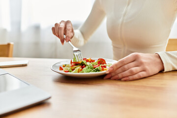 Embracing a vibrant morning with a nutritious salad in a cozy kitchen setting