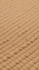 Texture of woven jute carpet showcasing its natural organic fibers