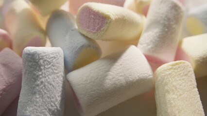Close-up of colorful marshmallows with soft texture and light interplay