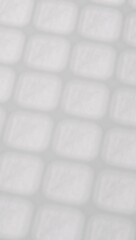 Rough-textured white paper background