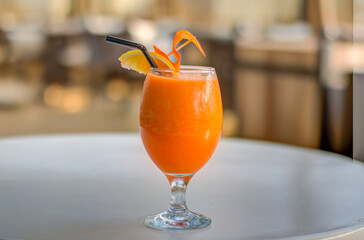 Fresh Orange Juice in a glass in summer
