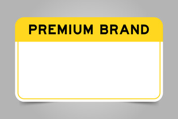 Label banner that have yellow headline with word premium brand and white copy space, on gray background