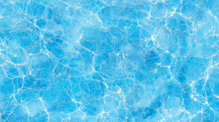 Fototapeta premium Clear blue water surface with sunlight reflections creating a sparkling pattern and ripples in a swimming pool