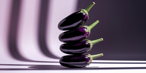 Elegant Stack of Fresh Eggplants Against Soft Purple Shadows