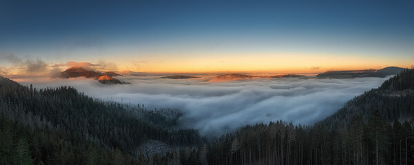 fog over the Liptov village of Velke Borove before sunrise