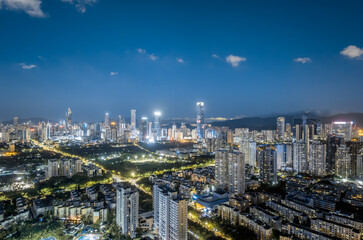 Fototapeta premium Aerial view of Shenzhen city skyline illuminated at night