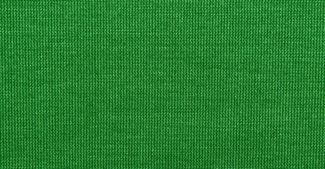green fabric texture as background