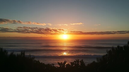 The Embrace of the Sun and the Ocean. Beautiful sunrise scenery over the sea with reflection on the surface