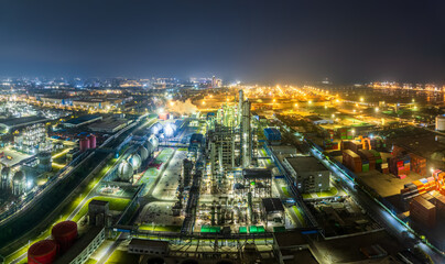 Aerial view of illuminated industrial park at night