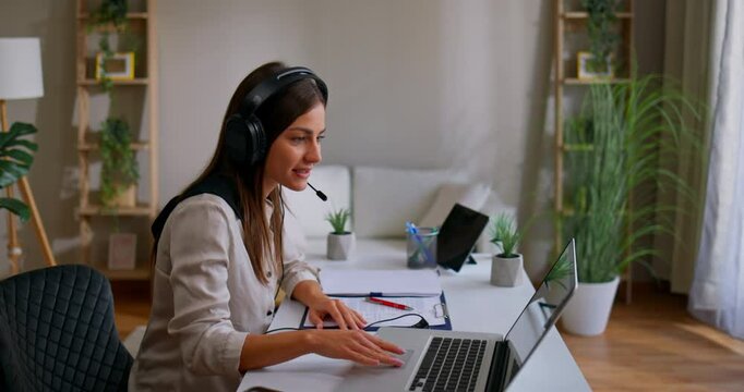 Customer service representative working from home providing support to clients