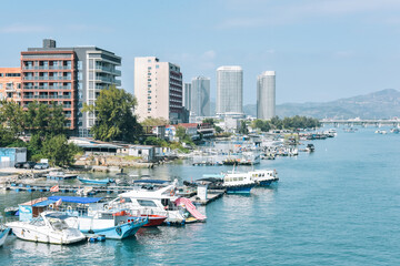 Urban skyline of the port dock under the Gangkou Bridge in Gangkou Town, Shuangyue Bay, Huidong County, Huizhou, Guangdong Province, China, shot in January
