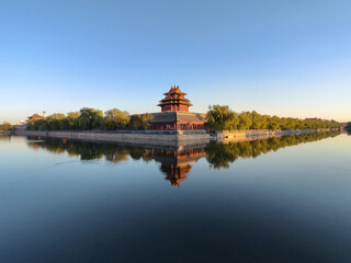 Fototapeta premium Beautiful water reflection of Forbidden City Corner Tower or Jiaolou in Beijing, China.