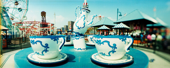 Panoramic view of tea cup rides in an amusement park, Luna Park, Coney Island, Brooklyn, New York City, New York State, USA.
