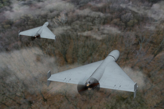 A pair of drones in action - attack drones over dense forest.