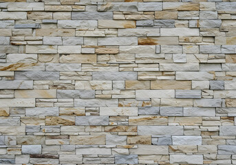 Fototapeta premium Stone Wall Cladding Texture, Natural Rock Slate Background, Beige and Gray Brick Pattern for Exterior Design