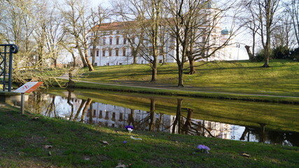 On the hill surrounded by a moat stands a historic castle