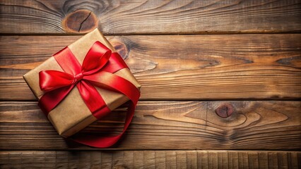 Fototapeta premium Red ribbon wrapped around a present on a wooden table, red gift, gift wrapping, red gift