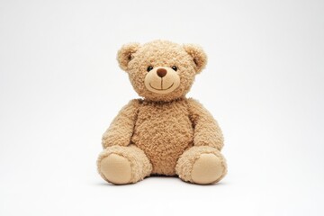 Obraz premium A cozy teddy bear sitting softly on a clean surface, exuding warmth and charm for all ages isolated on transparent background