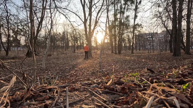 Extreme off-road electric scooter ride in forest plantation.