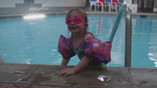 Cute Little Girl Afraid of the Cold Water