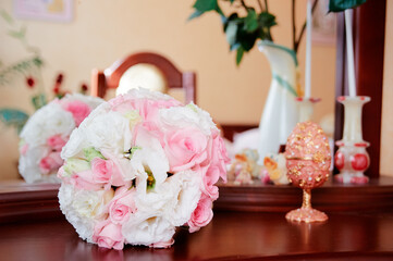Elegant Pink and White Floral Bouquet on Ornate Wooden Dressing Table..
