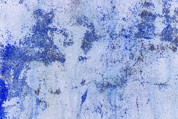 Weathered and depainted blue cement walls