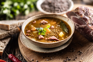 Lentil stew or soup with smoked pork meat, traditional Slovak or Czechv food
