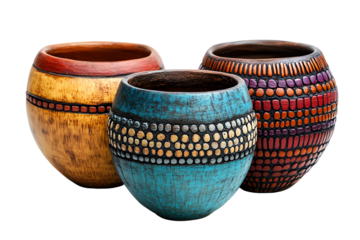 Three colorful decorative pots with distinctive patterns, perfect for showcasing artistic craftsmanship against a white isolated background.