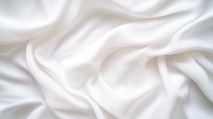 Fototapeta premium This image features a detailed close-up of white fabric displaying smooth drapes and gentle folds, emphasizing elegance and softness to highlight refined aesthetic appeal.